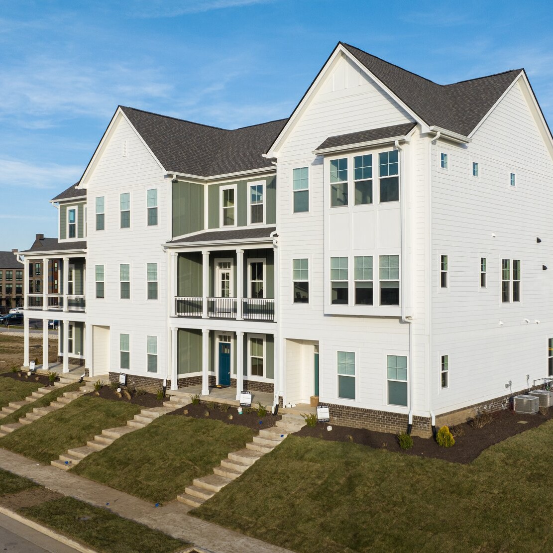 An aerial view of a custom two story townhouse.